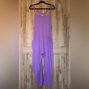 •F R E E.. P E O P L E.. Hot shot Onesie•